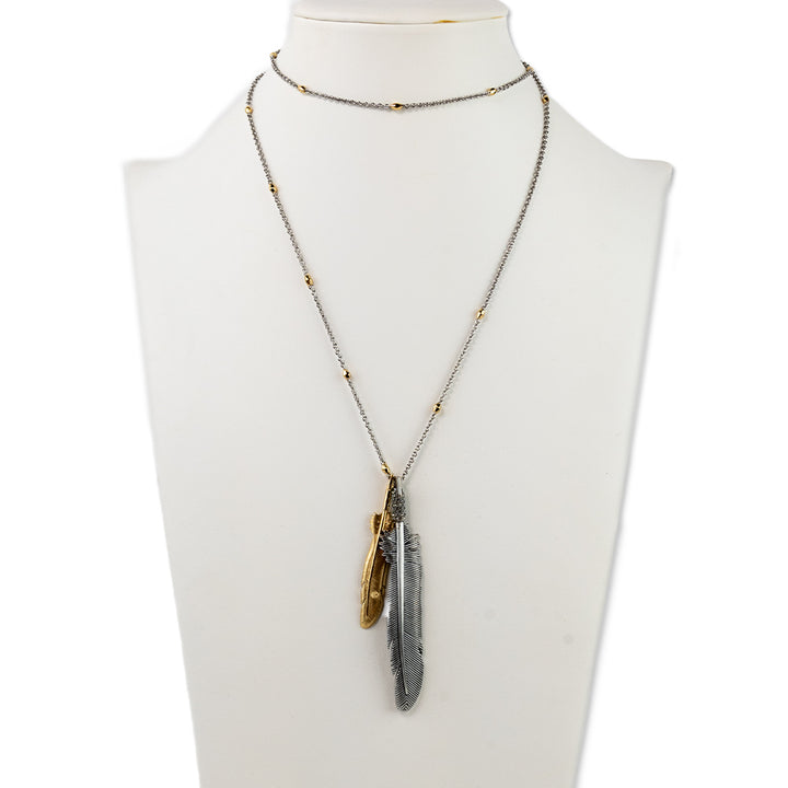 Coach Silver and Gold Toned Feather Pendant Necklace