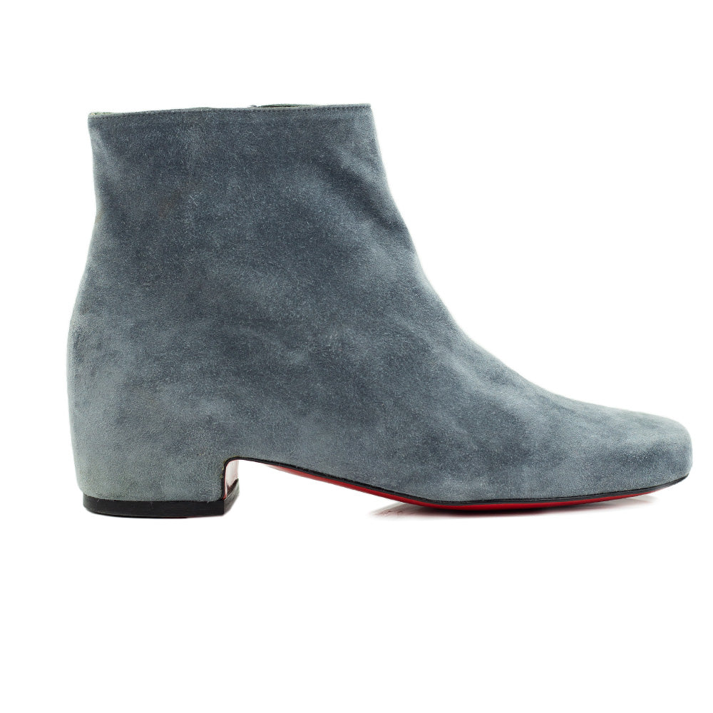 side view of Christian Louboutin Tounoir Booty Gray Suede Ankle Boots