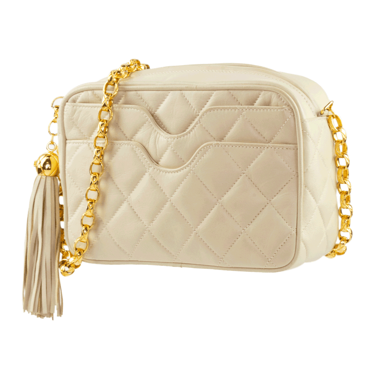 side view of Chanel Vintage Cream Quilted Leather Camera Bag