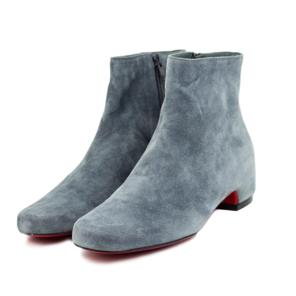 side view of Christian Louboutin Tounoir Booty Gray Suede Ankle Boots