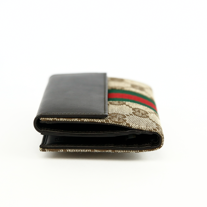 side view of Gucci GG Canvas & Leather Jackie Compact Wallet