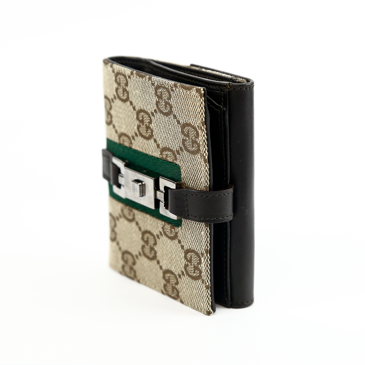 side view of Gucci GG Canvas & Leather Jackie Compact Wallet