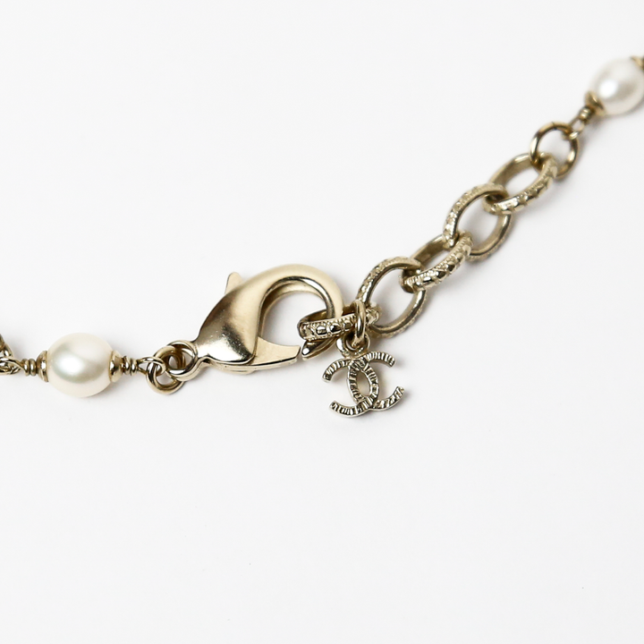 clasp view of Chanel Strass & Enamel Pearl Station Necklace