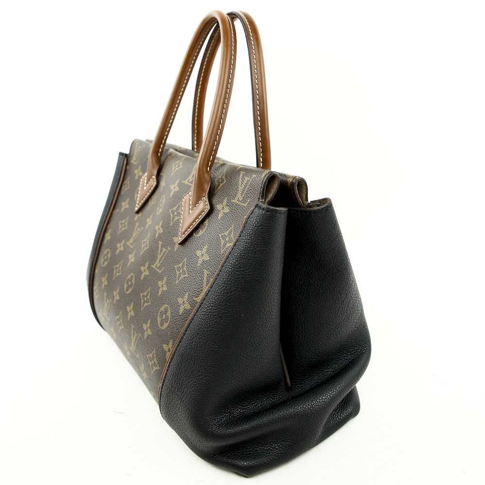 side view of Louis Vuitton Monogram Canvas & Black Leather W PM Bag