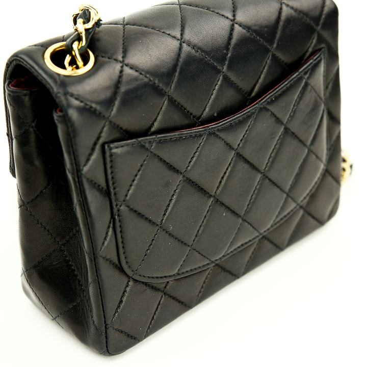 Back view of Chanel Black Lambskin Classic Square Mini Flap Bag (2000)