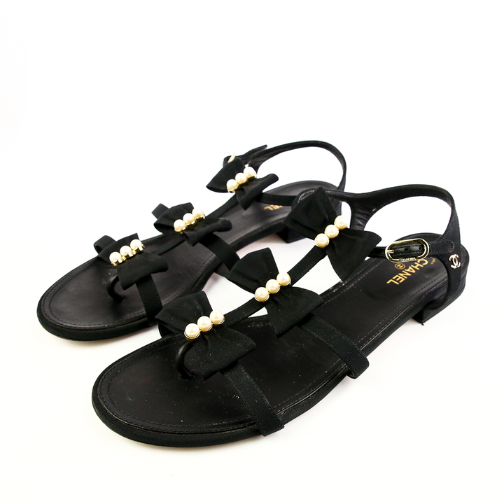 Side view of Chanel Black Fabric & Pearl Bow Sandals