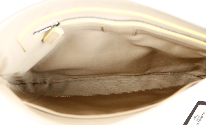 interior view of MCM Beige Leather Aren Monogram Crossbody Pouch