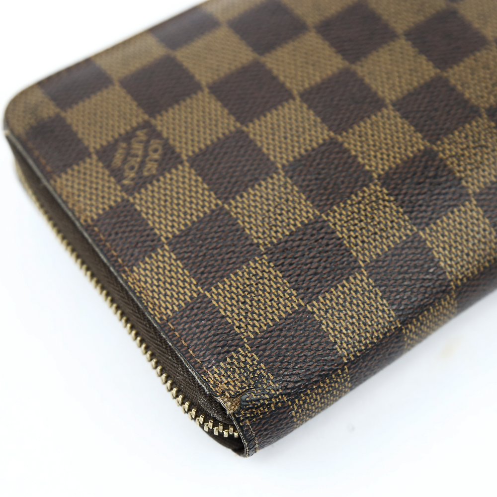 corner view of Louis Vuitton Damier Ebene Large Zip-Around Wallet