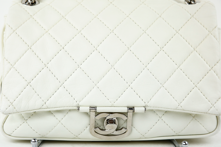 turnlock view of Chanel Icons Secret Label Ivory Leather Shoulder Bag