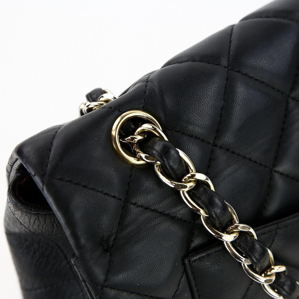 hardware view of Chanel Black Lambskin Single Flap Maxi Handbag