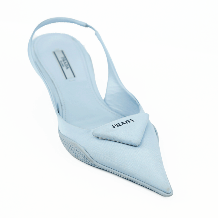 side view of Prada Baby Blue Nylon Triangle Logo Slingback Pumps