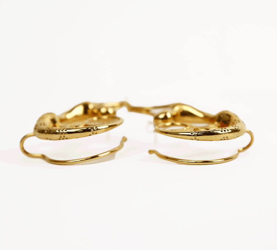 top view of Lanvin Gold Mermaid Cuffed Post Earrings