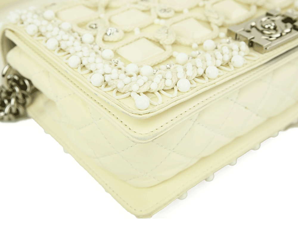 Corner view of Chanel Cream Embellished Medium Boy Bag