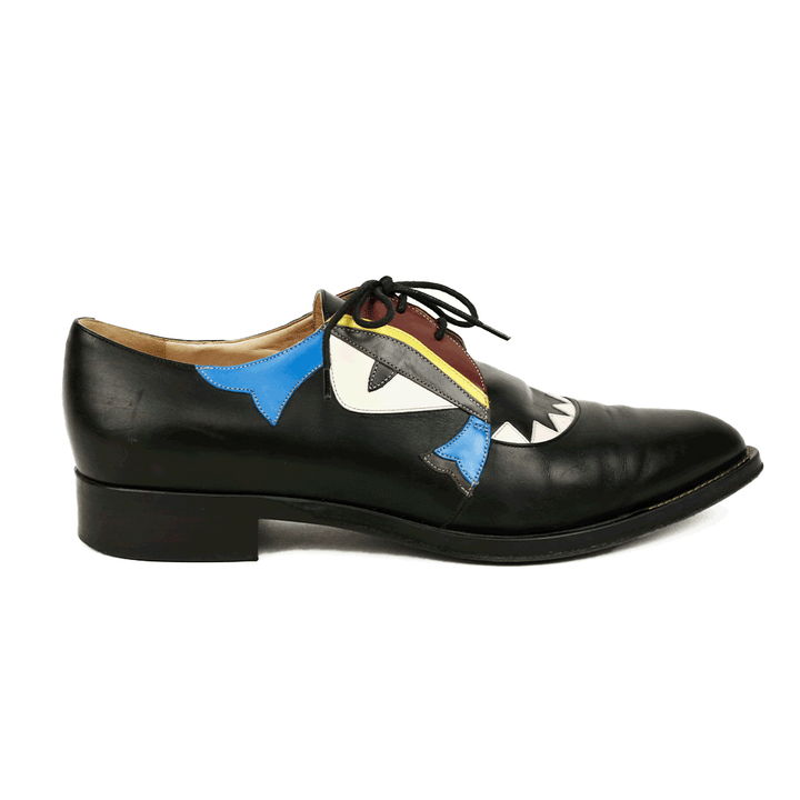 side view of Fendi Black Leather Monster Eye Oxfords