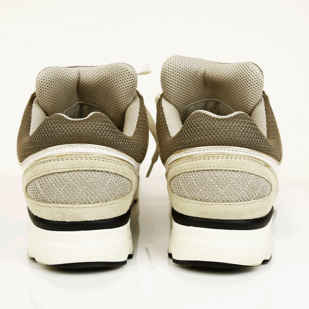 back view of Chanel Interlocking CC Gray & Gold Sneakers