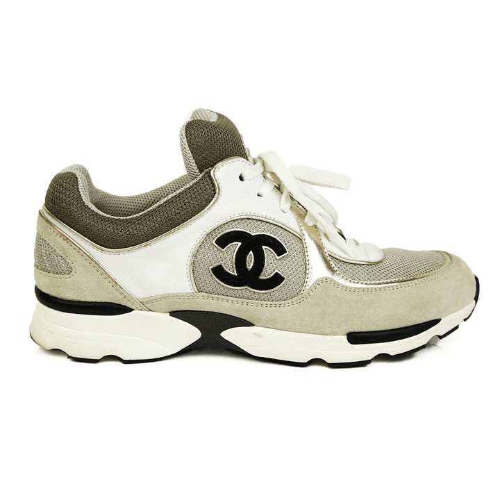 side view of Chanel Interlocking CC Gray & Gold Sneakers