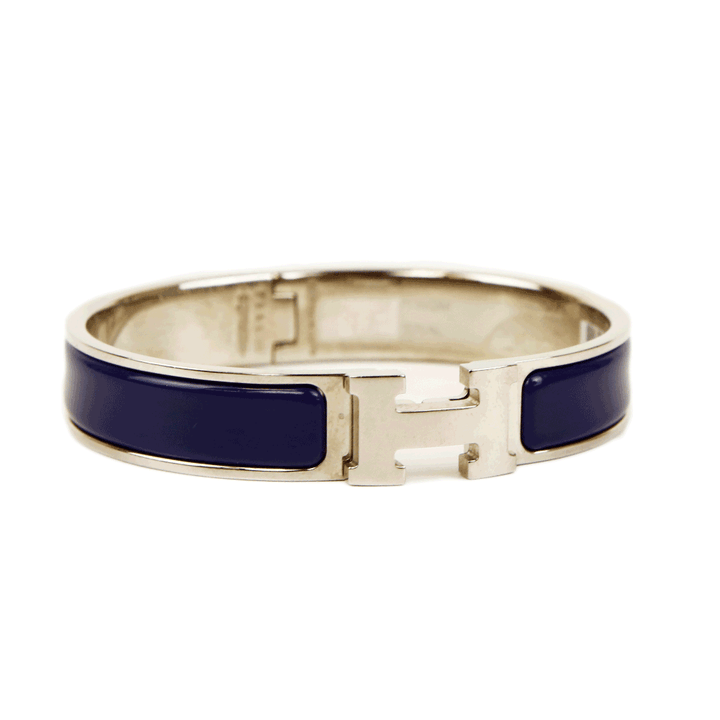 side view of Hermès Navy & Silver Clic H Bangle