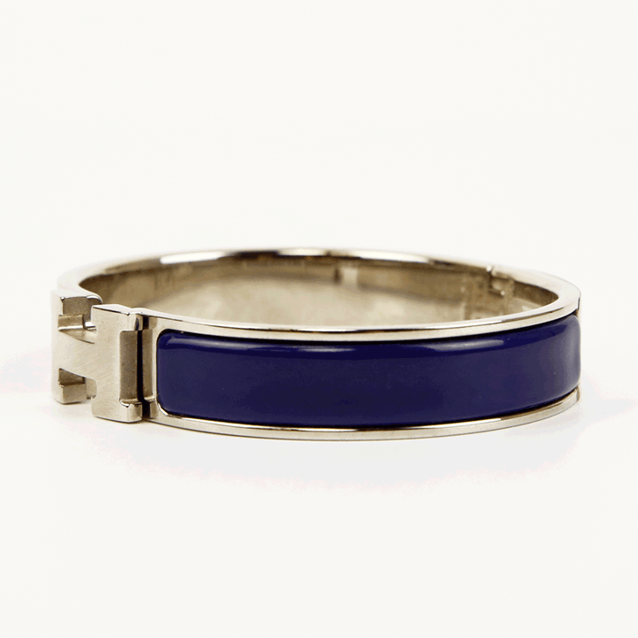 side view of Hermès Navy & Silver Clic H Bangle