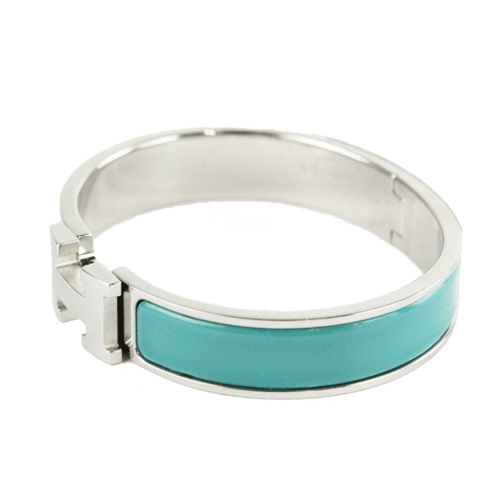 Side View of Hermès "Clic H" Blue & Silver Narrow Bangle